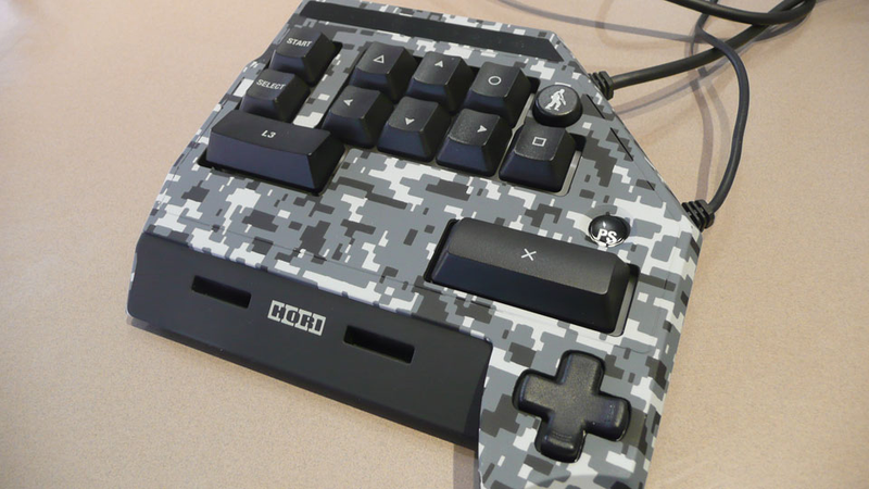 Illustration for article titled Hori's TAC3 Brings a Mouse and (Tiny) Keyboard to the PS3